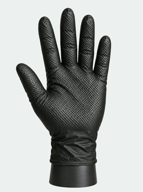 OM Diamond Grip black nitrile glove, palm view showing the raised diamond texture